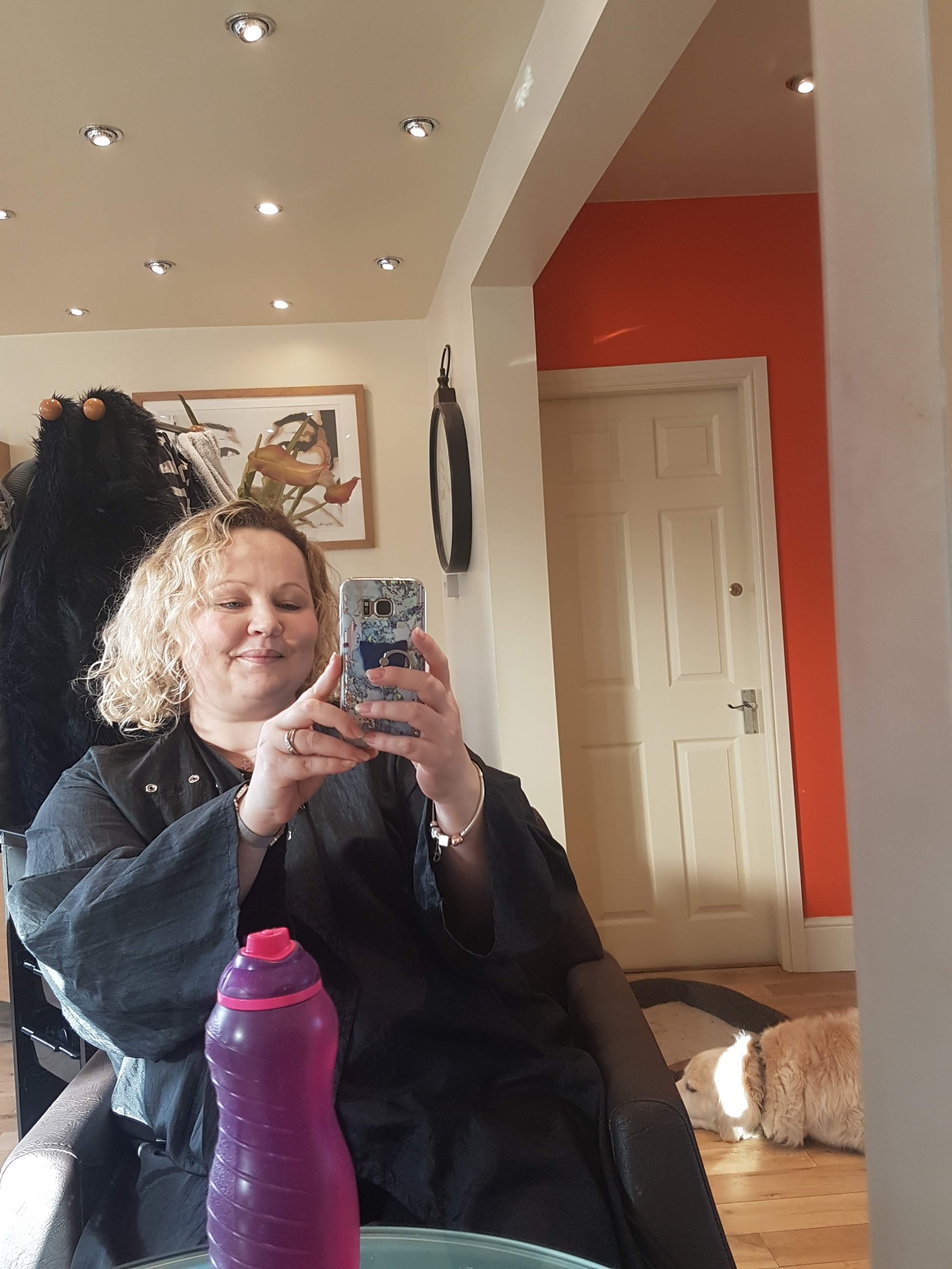 A customer enjoying her salon visit at Esquire Et Cie